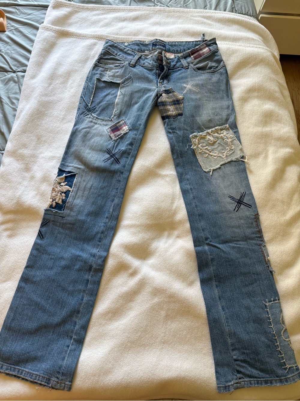 Vintage Rebel Blue Patchwork Flare Jeans with Distressed Accents